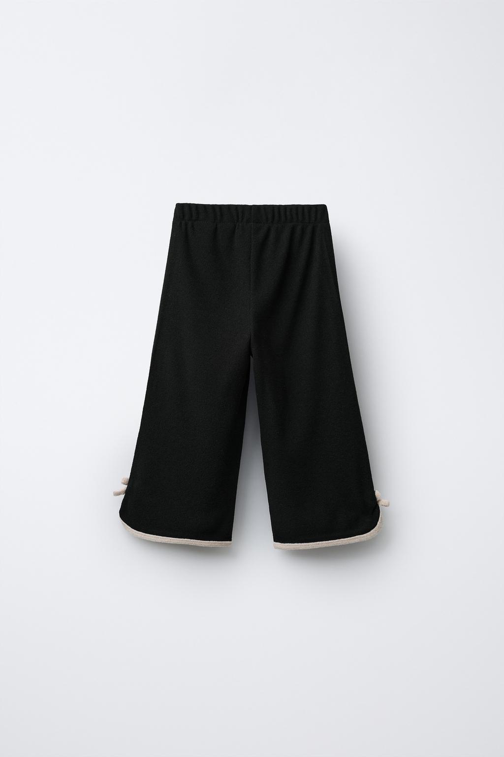 БРЮКИ-КЮЛОТЫ ИЗ МЯГКОЙ ТКАНИ С КОНТРАСТНЫМ БАНТОМ