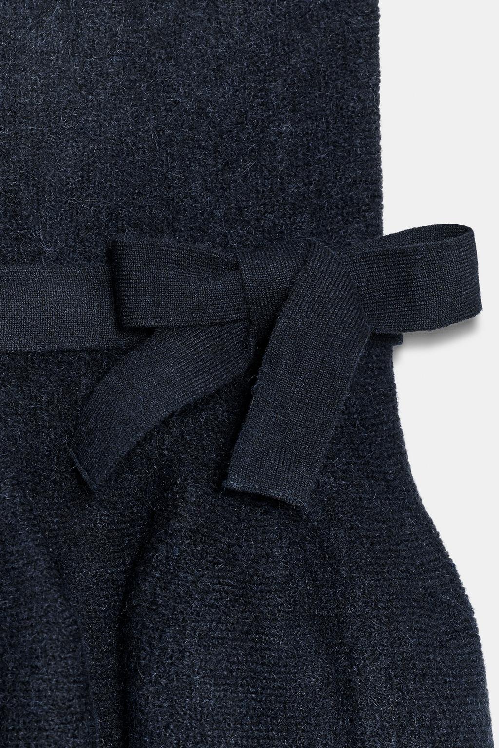 ТРИКОТАЖНЫЙ ТОП С БАСКОЙ И ЗАВЯЗКАМИ