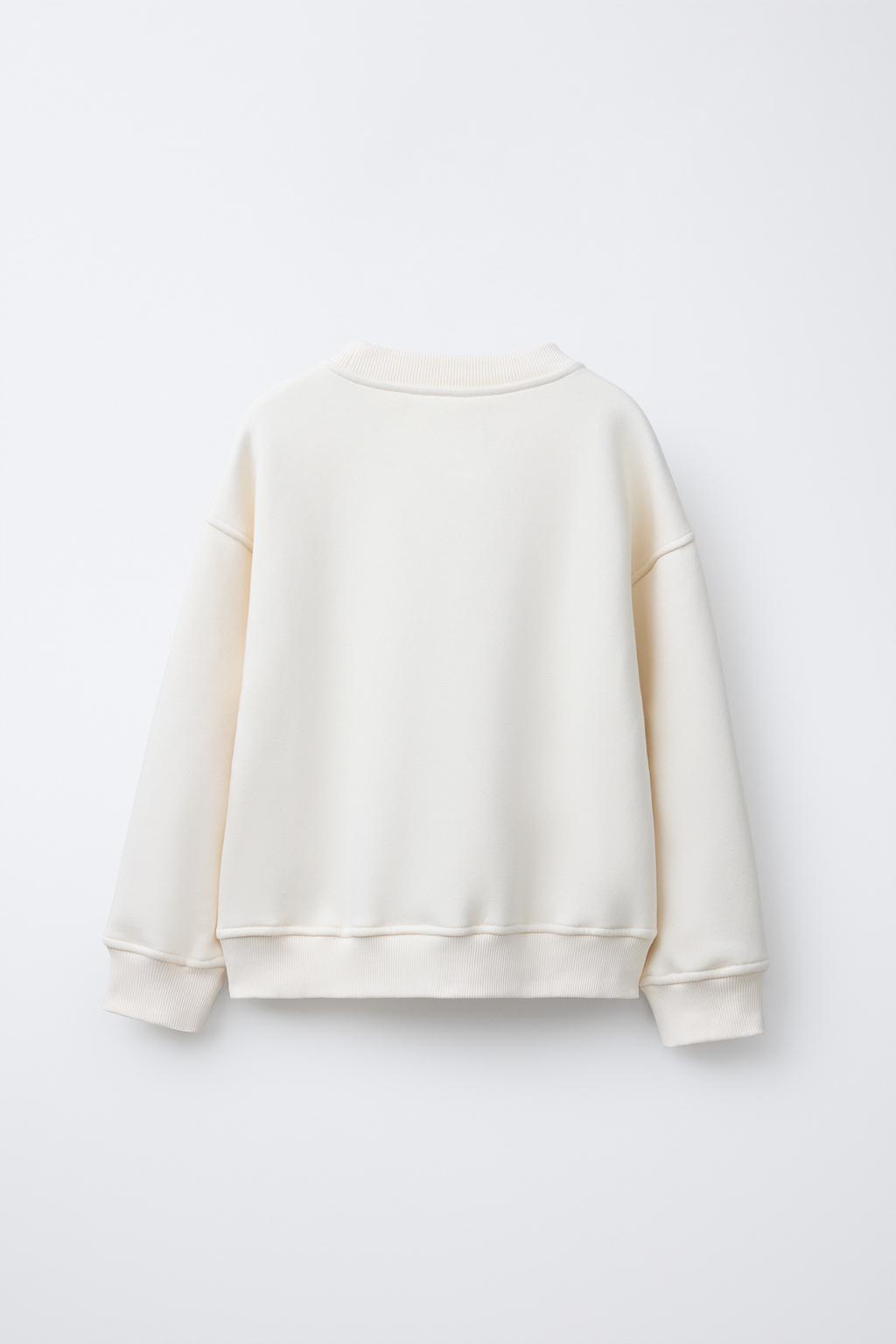 ТОЛСТОВКА С ЦВЕТОЧНЫМИ БУСИНАМИ