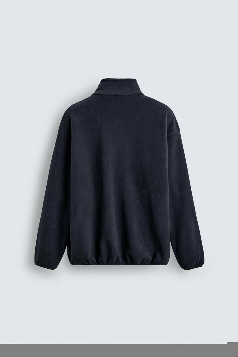 АНОРАК ИЗ ИСКУССТВЕННОЙ ОВЧИНЫ С ВЫШИВКОЙ