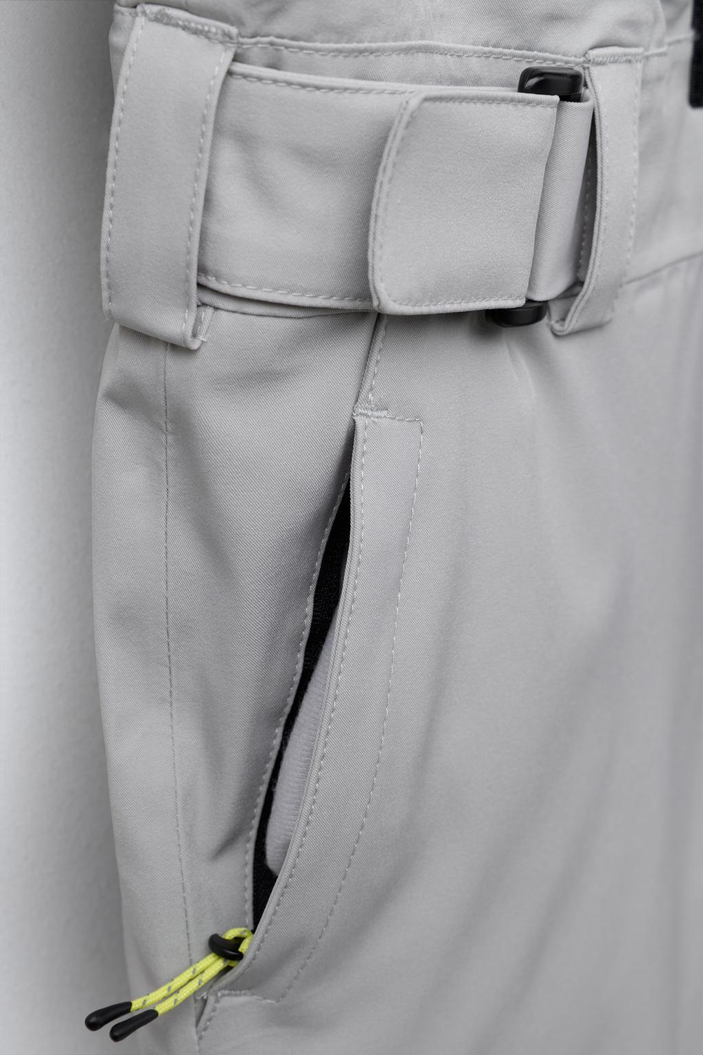 WINDPROOF AND WATER-RESISTANT HOODED JUMPSUIT RECCO® SYSTEM SKI COLLECTION