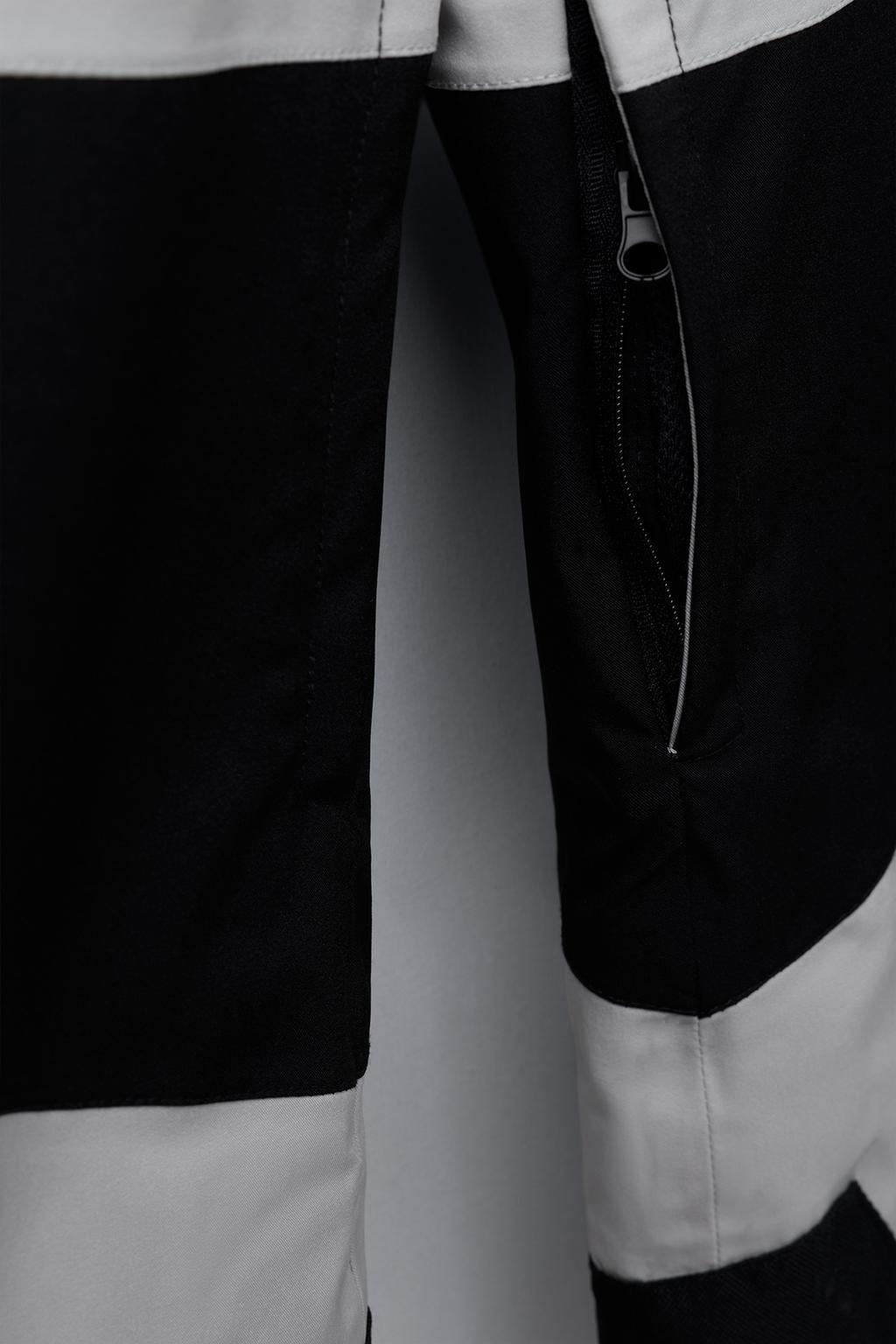 WINDPROOF AND WATER-RESISTANT HOODED JUMPSUIT RECCO® SYSTEM SKI COLLECTION