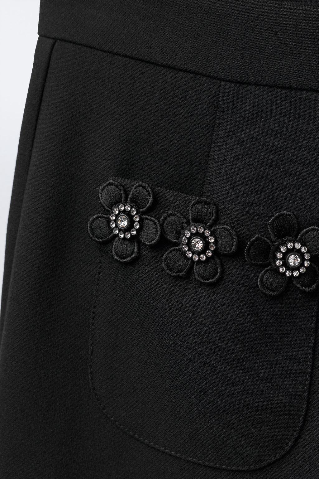 БРЮКИ С ЦВЕТОЧНЫМИ УКРАШЕНИЯМИ