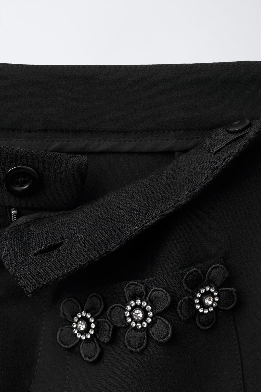 БРЮКИ С ЦВЕТОЧНЫМИ УКРАШЕНИЯМИ