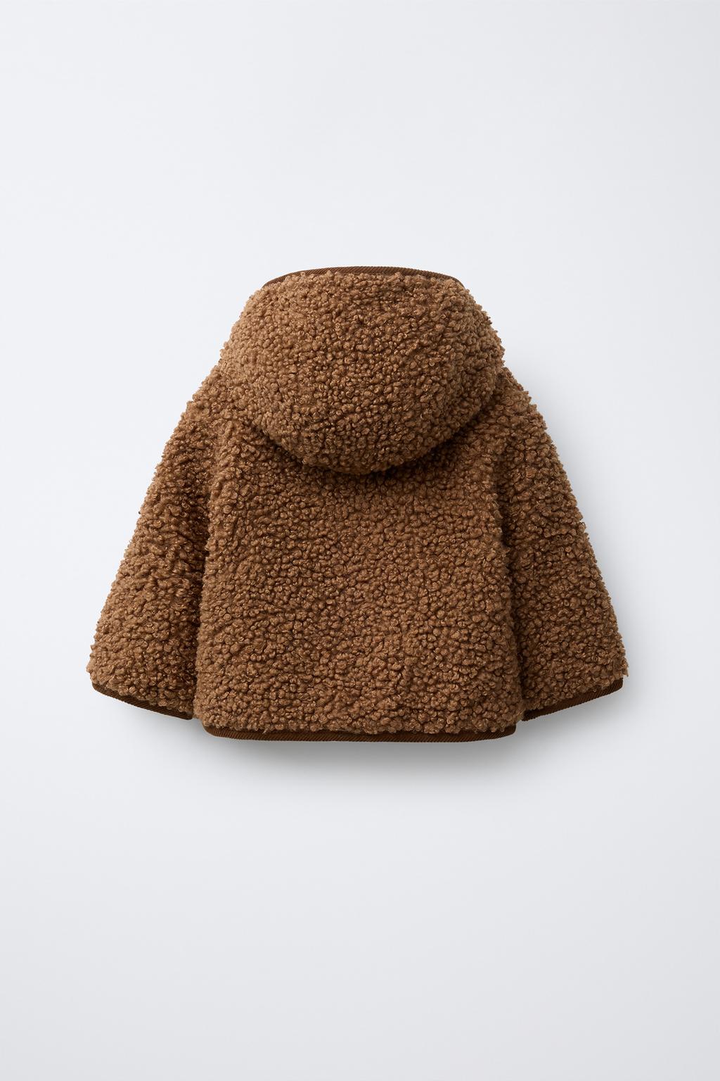 КУРТКА ИЗ ИСКУССТВЕННОЙ ОВЧИНЫ С НАВЕСНЫМИ ПЕТЛЯМИ