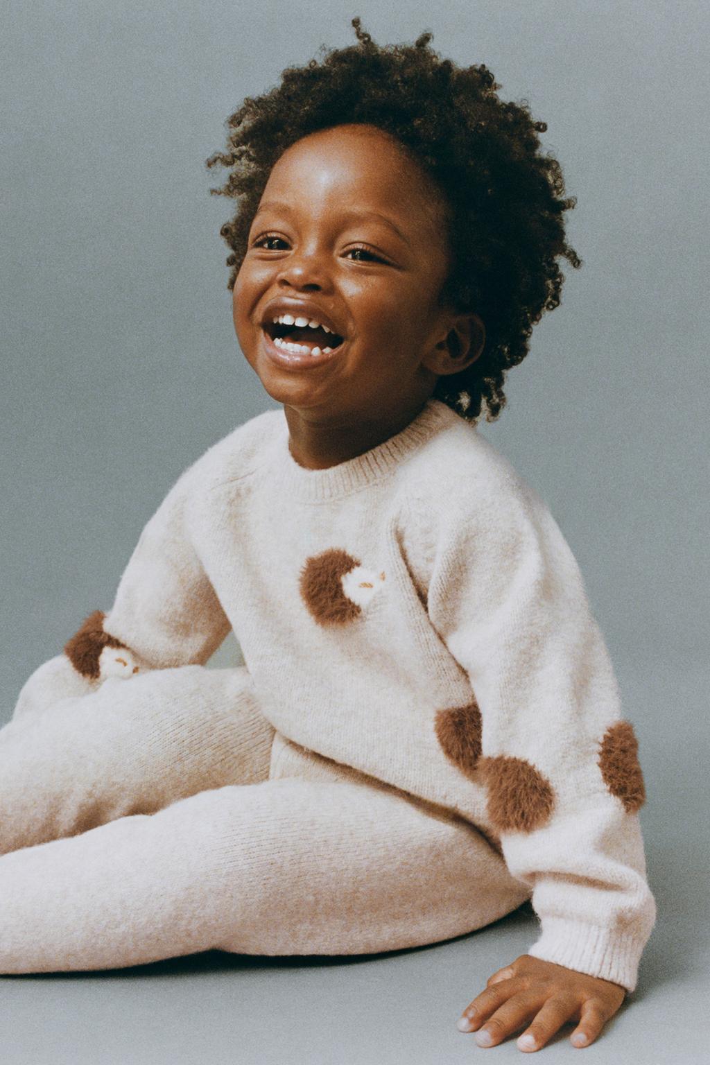 ТРИКОТАЖНЫЕ ЛЕГИНСЫ С КАРМАНОМ И ЭТИКЕТКОЙ С ЕЖИКОМ