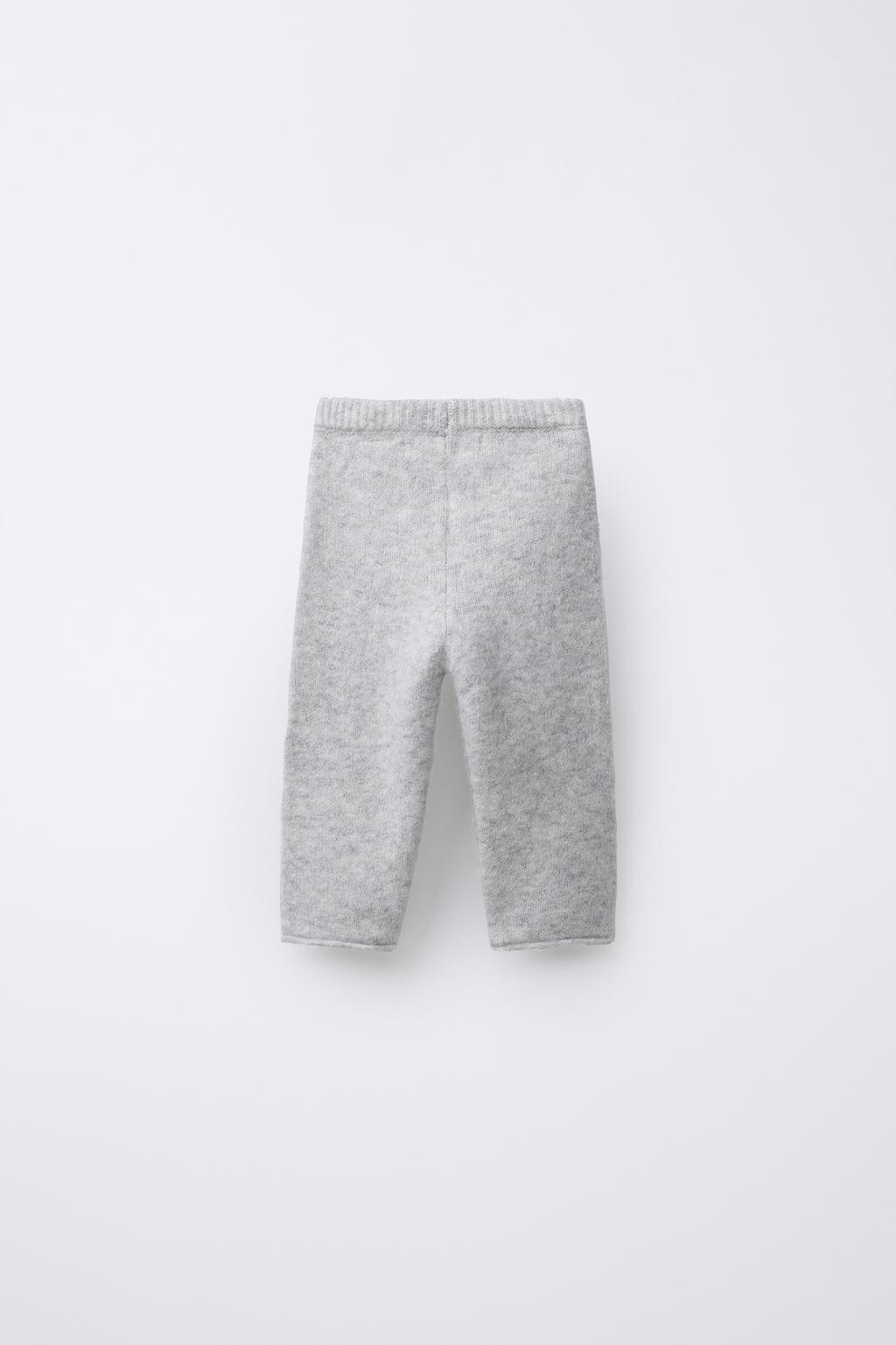 ТРИКОТАЖНЫЕ БРЮКИ С ВЫШИВКОЙ ЦВЕТОВ