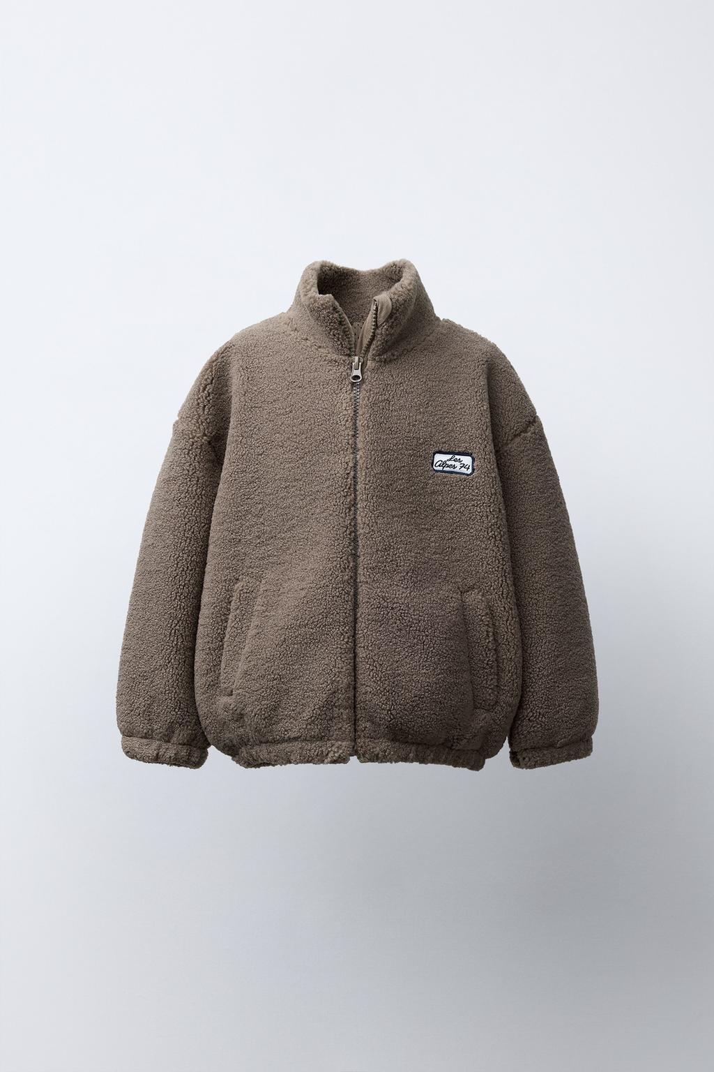 КУРТКА ИЗ ИСКУССТВЕННОЙ ОВЧИНЫ С ВЫШИВКОЙ