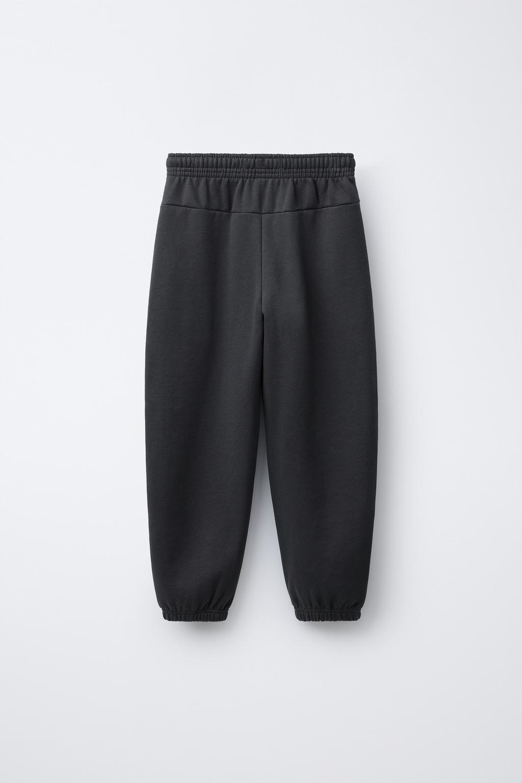 БРЮКИ-ДЖОГГЕРЫ С ТЕКСТОВЫМ ПРИНТОМ