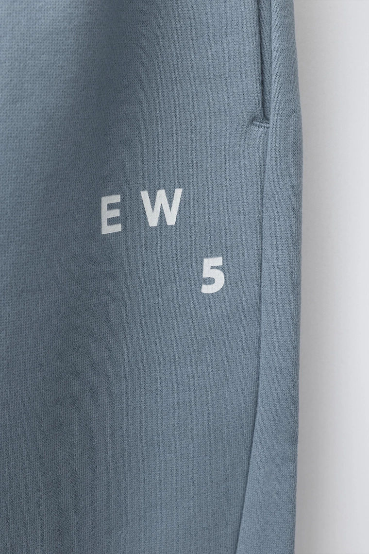 БРЮКИ-ДЖОГГЕРЫ С НАДПИСЬЮ