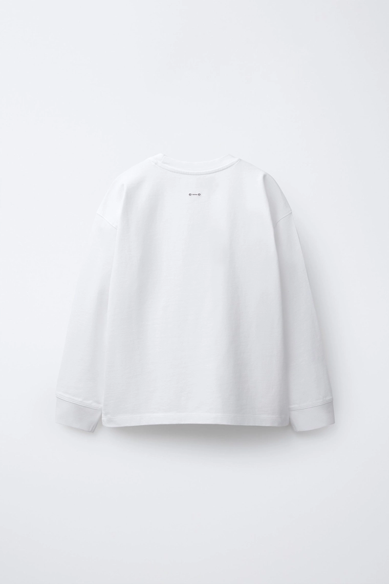 ФУТБОЛКА ИЗ ПЛОТНОЙ ТКАНИ С ЭФФЕКТОМ ПОТЕРТОСТИ