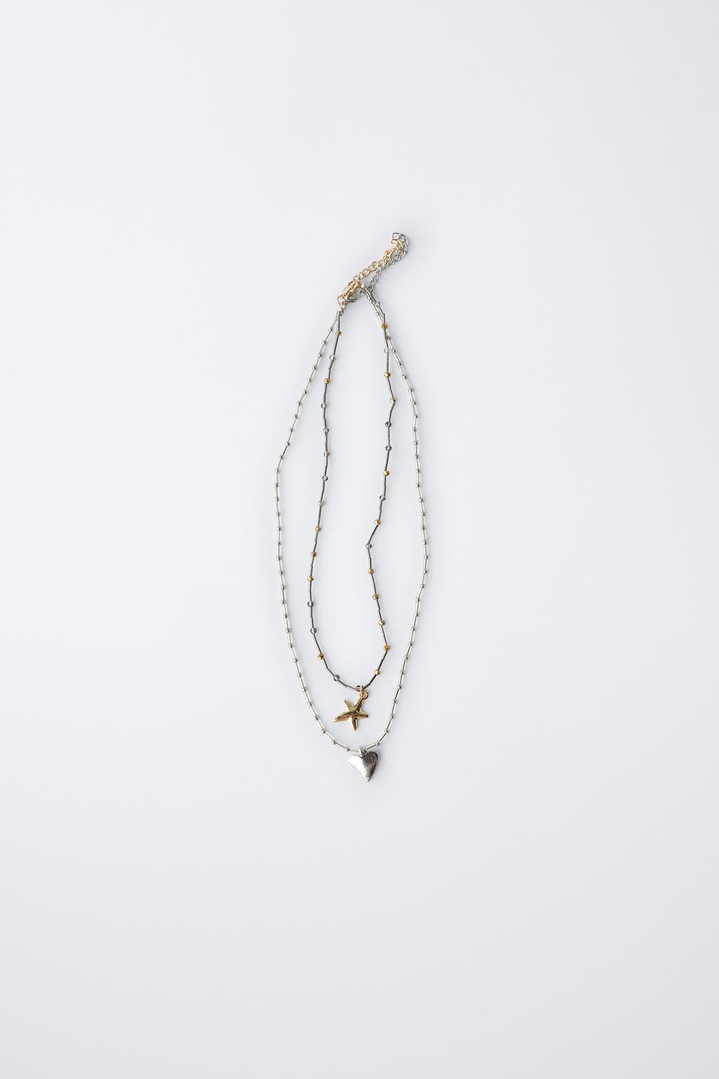 Набор из двух кулонов в виде сердца и звезды