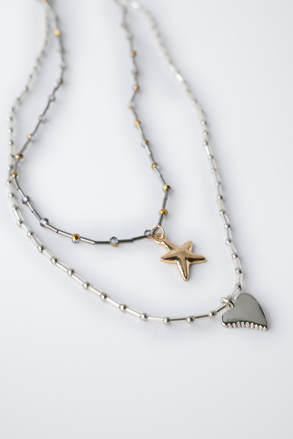 Набор из двух кулонов в виде сердца и звезды