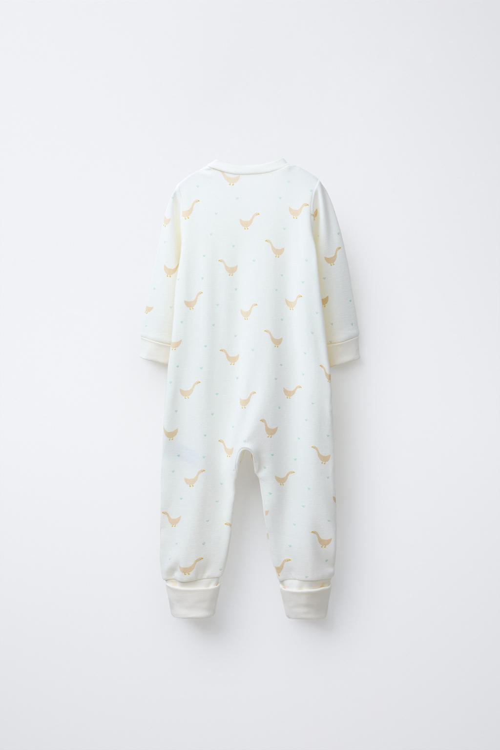 ТЕПЛЫЙ КОМБИНЕЗОН С УЗОРОМ «ГУСИ» И РЕГУЛИРУЕМЫМИ ШТАНИНАМИ