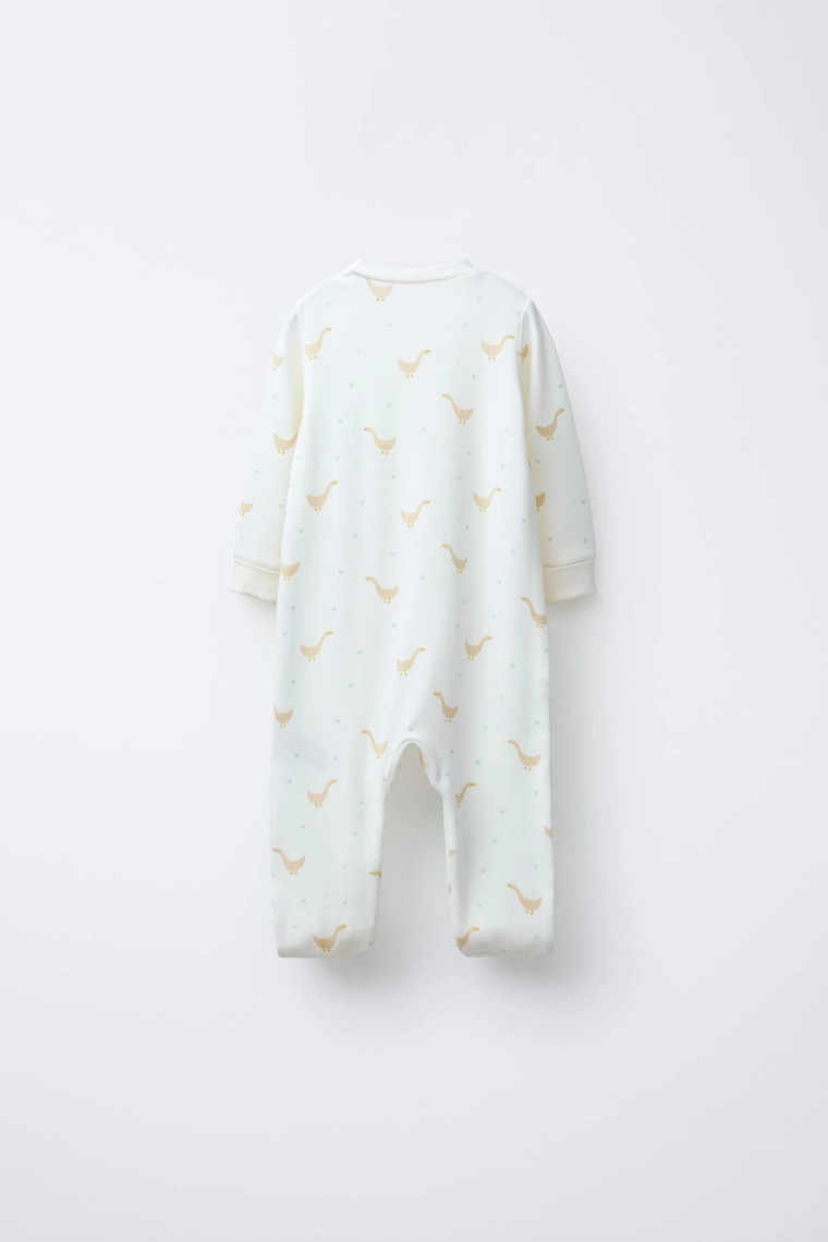 ТЕПЛЫЙ КОМБИНЕЗОН С УЗОРОМ «ГУСИ» И РЕГУЛИРУЕМЫМИ ШТАНИНАМИ