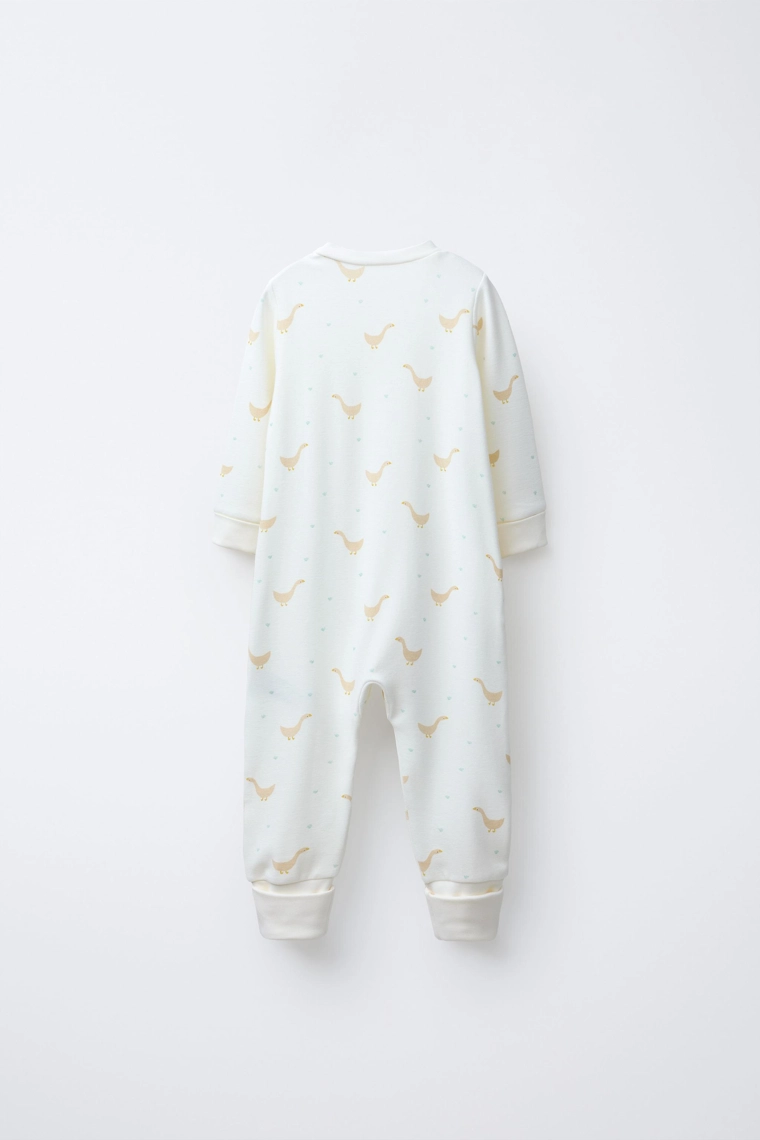 ТЕПЛЫЙ КОМБИНЕЗОН С УЗОРОМ «ГУСИ» И РЕГУЛИРУЕМЫМИ ШТАНИНАМИ