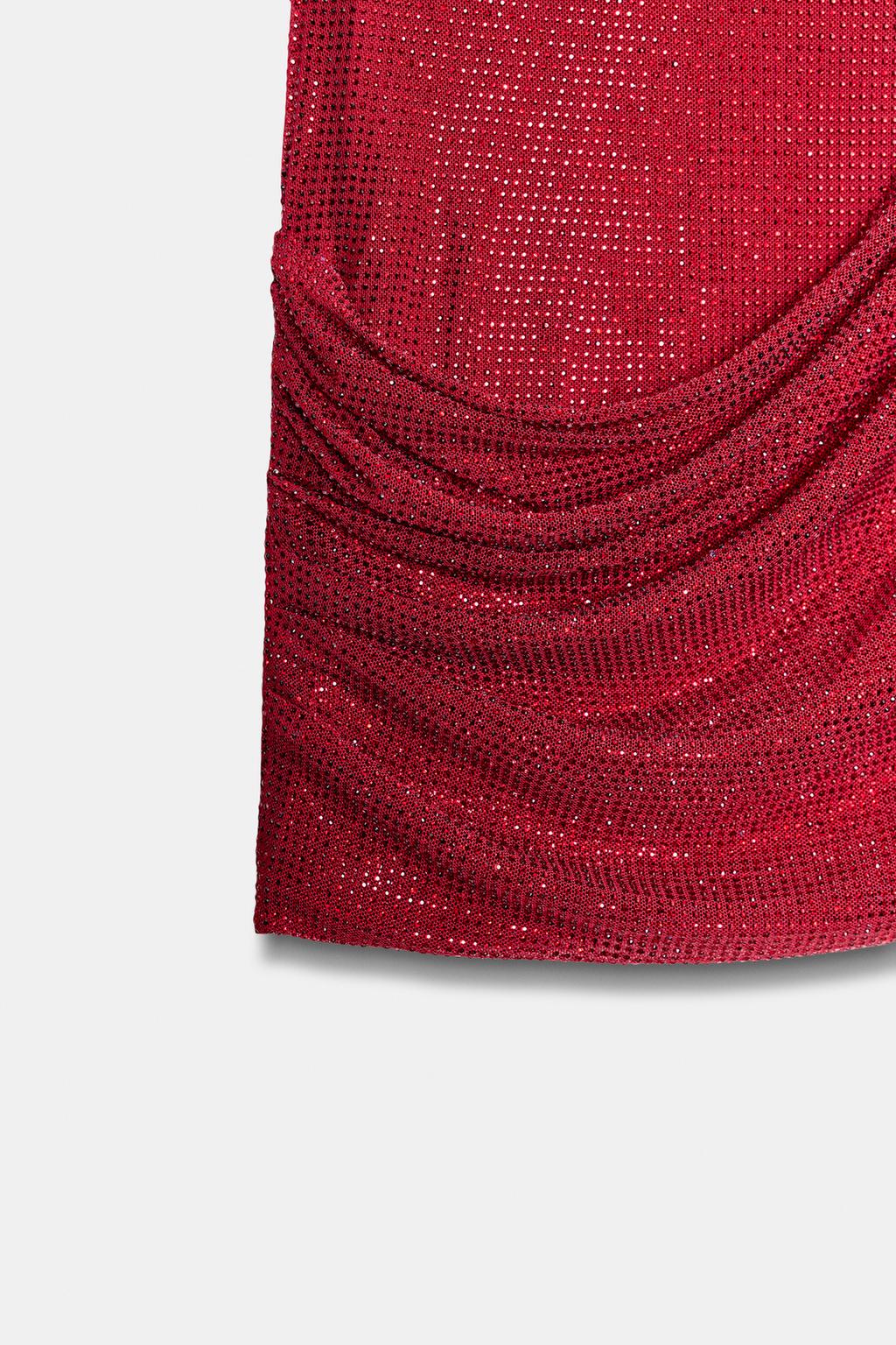 МИНИ-ЮБКА С ДРАПИРОВКОЙ И СТРАЗАМИ