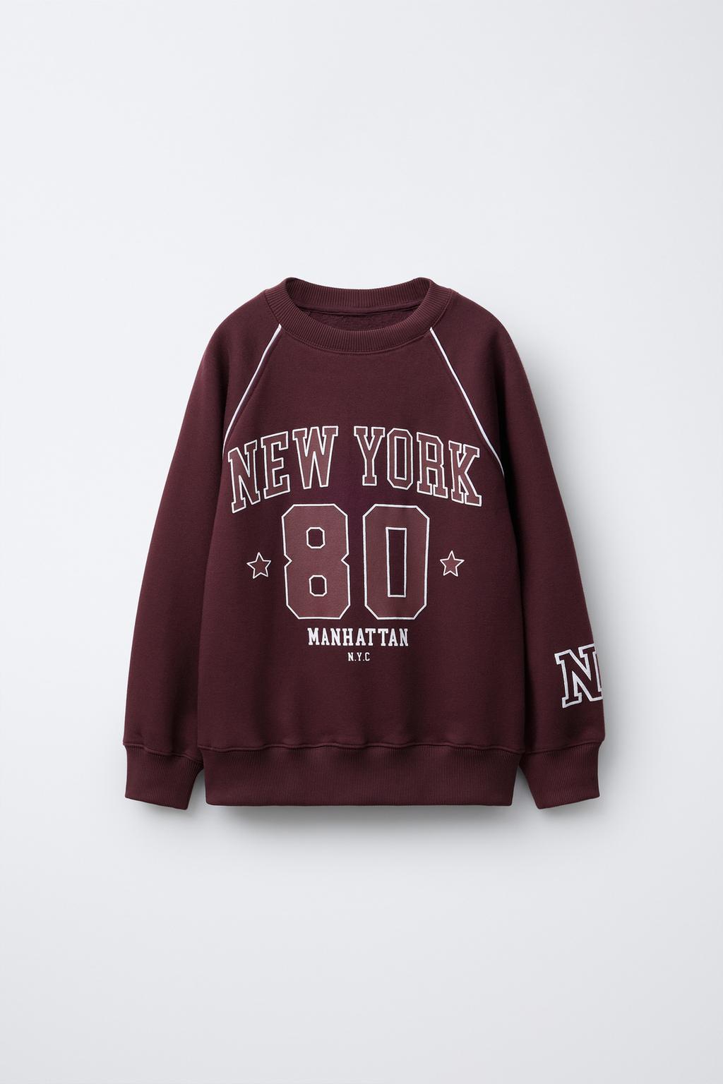 ТОЛСТОВКА С РУКАВАМИ РЕГЛАН, ТЕКСТОМ И ЦИФРОЙ