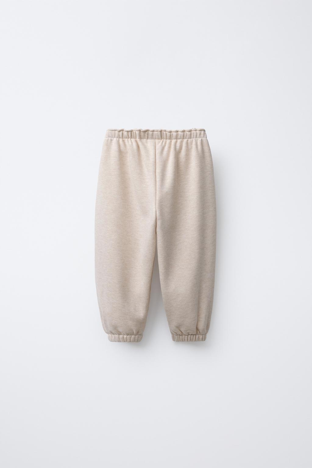 БРЮКИ-ДЖОГГЕРЫ С ЦВЕТОЧНЫМ КРУЖЕВОМ