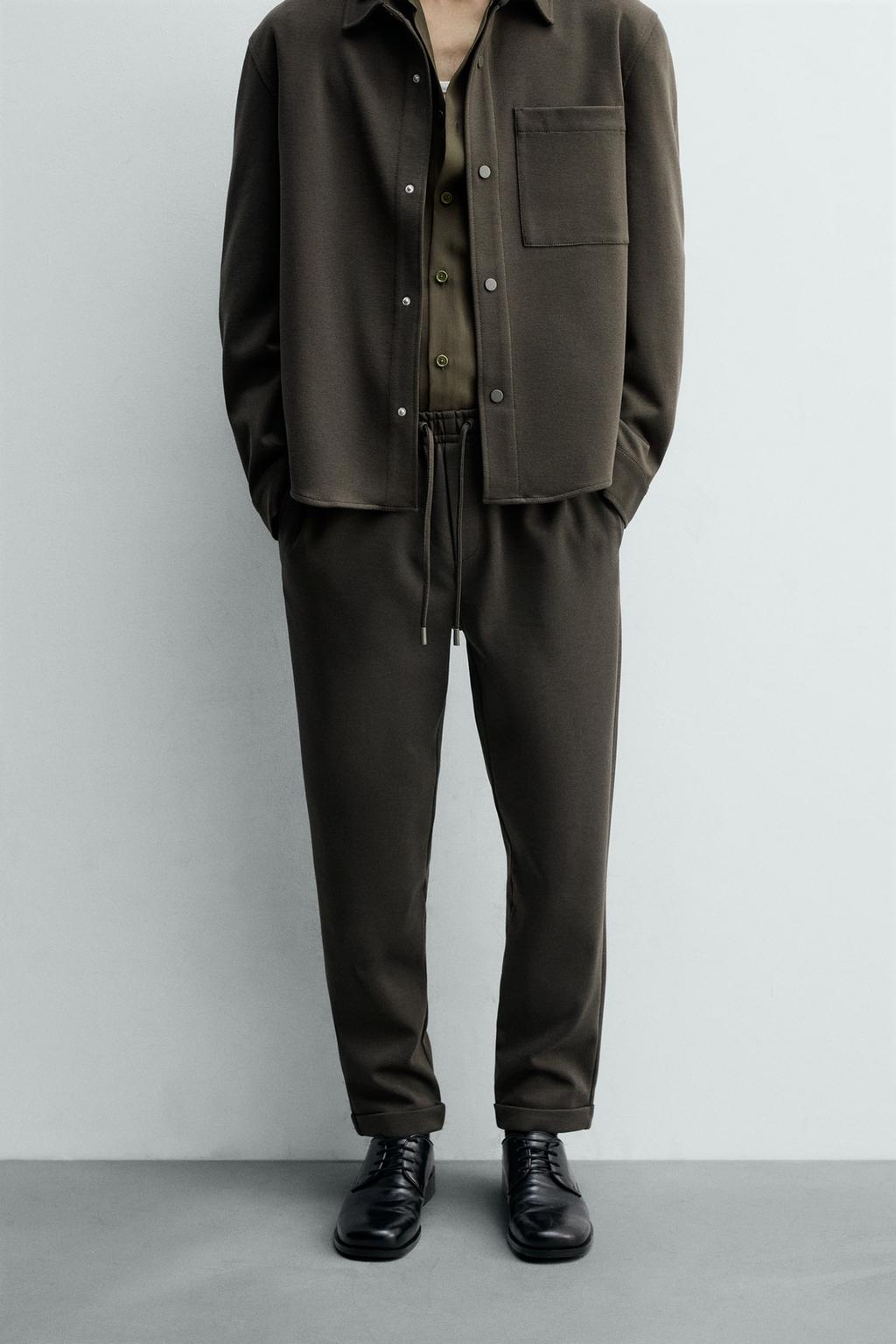 Комфортабельные брюки с манжетами на поясе без утюжки