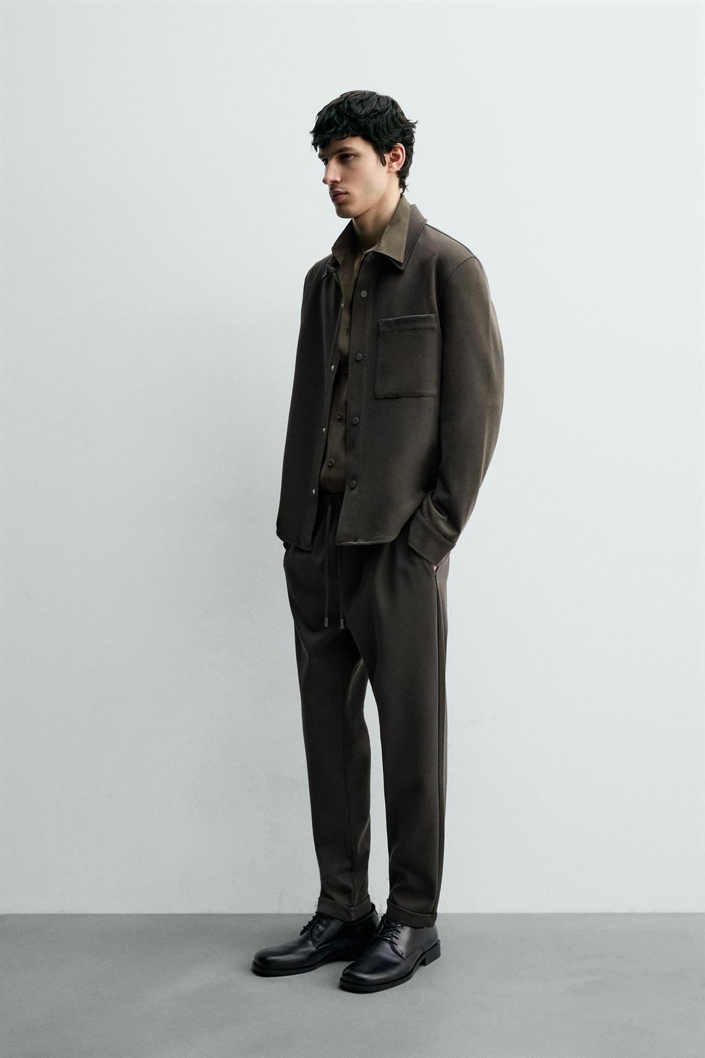 Комфортабельные брюки с манжетами на поясе без утюжки