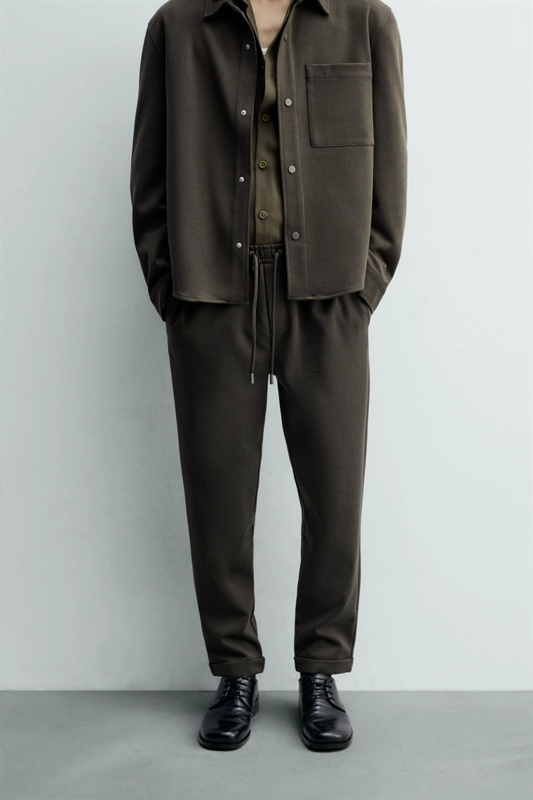 Комфортабельные брюки с манжетами на поясе без утюжки