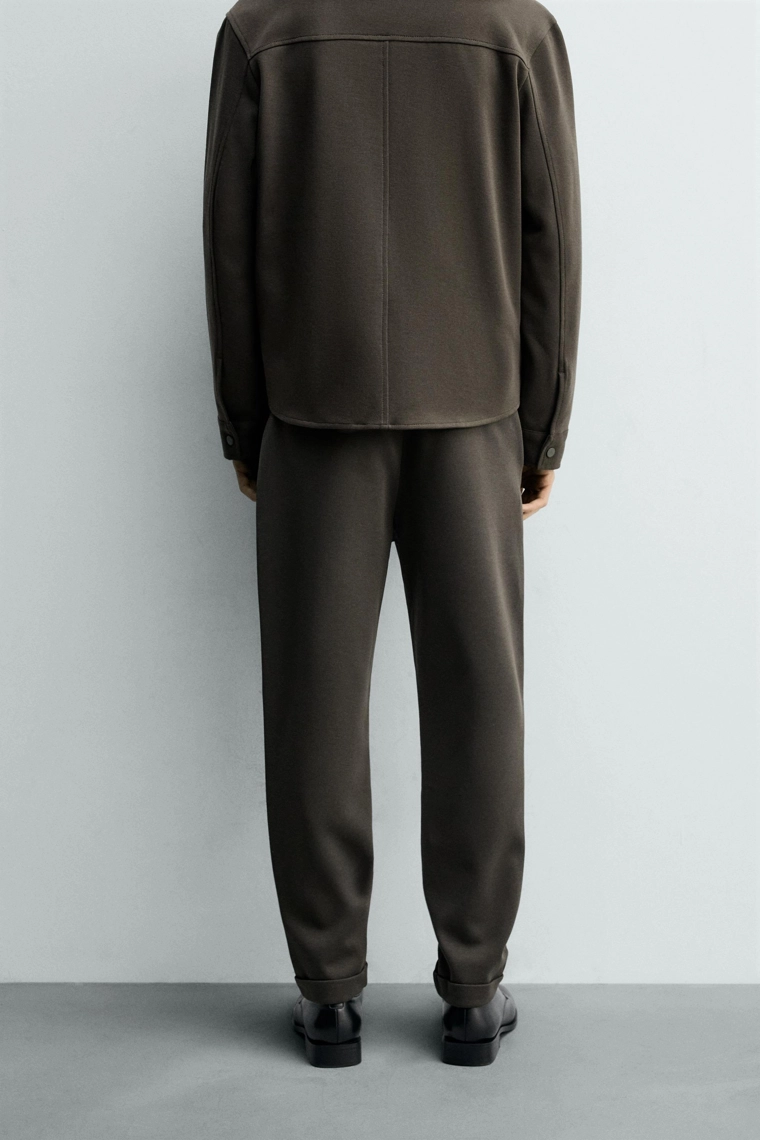 Комфортабельные брюки с манжетами на поясе без утюжки