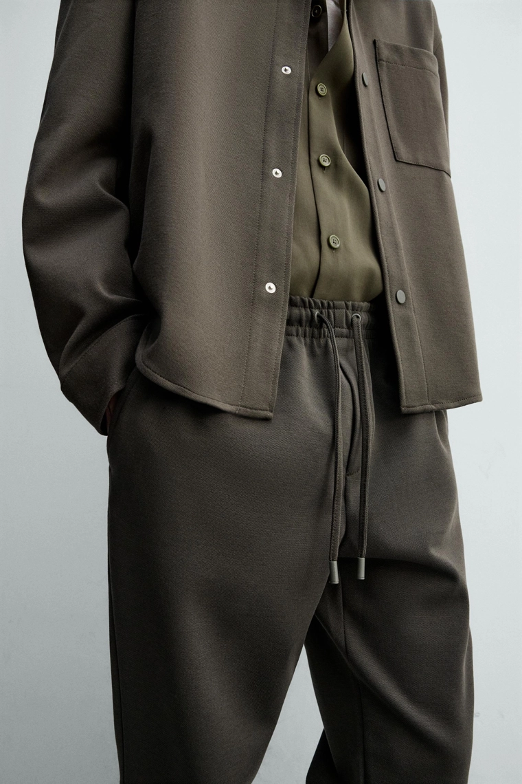 Комфортабельные брюки с манжетами на поясе без утюжки