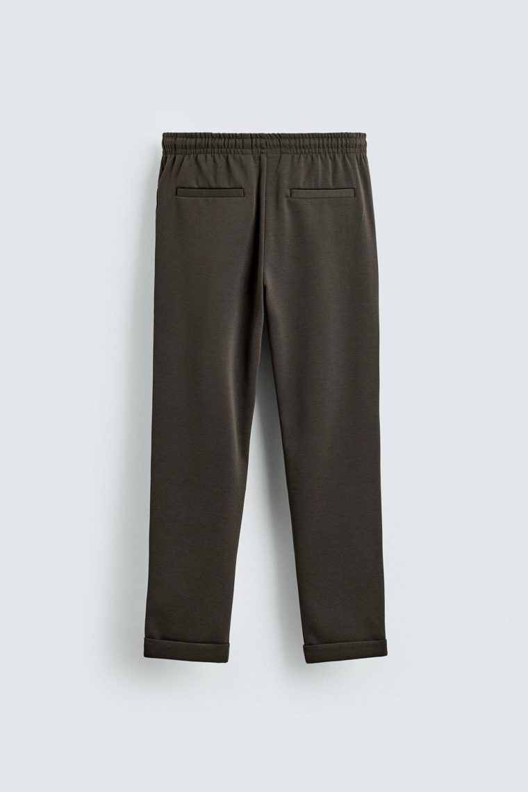 Комфортабельные брюки с манжетами на поясе без утюжки