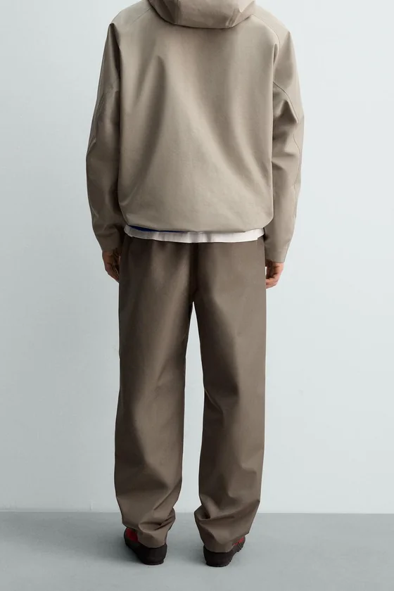 БРЮКИ SHELL ИЗ ВЫСОКОТЕХНОЛОГИЧНОЙ ТКАНИ AARON LEVINE X ZARA