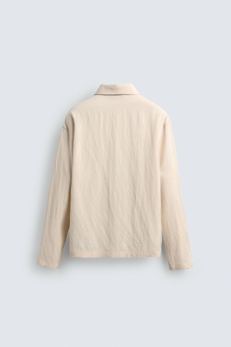 РУБАШКА ИЗ СТРУЯЩЕЙСЯ ТКАНИ СВОБОДНОГО КРОЯ AARON LEVINE X ZARA