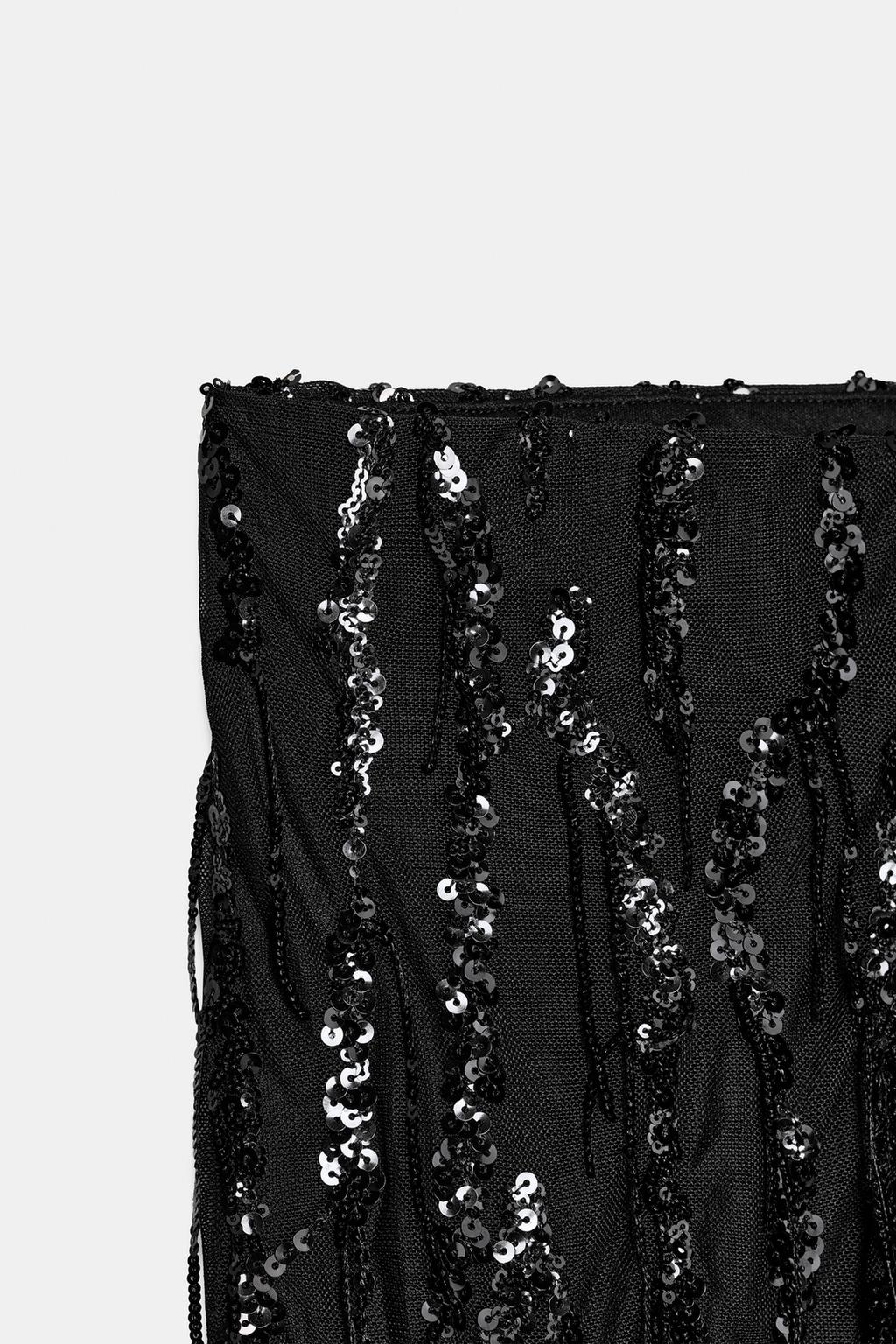 РАСКЛЕШЕННЫЕ ЛЕГИНСЫ С ПАЙЕТКАМИ