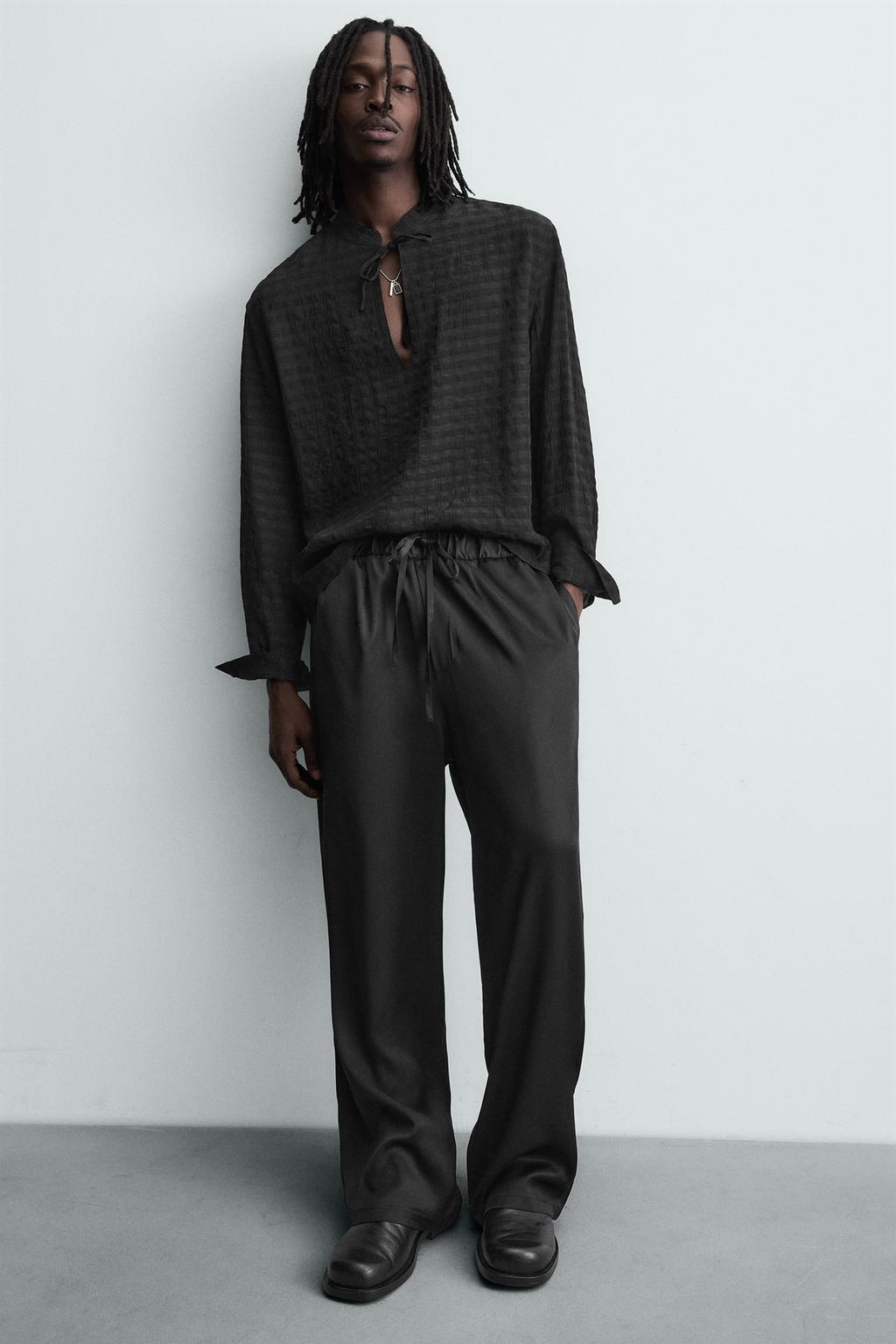 СТРУЯЩИЕСЯ БРЮКИ-ДЖОГГЕРЫ