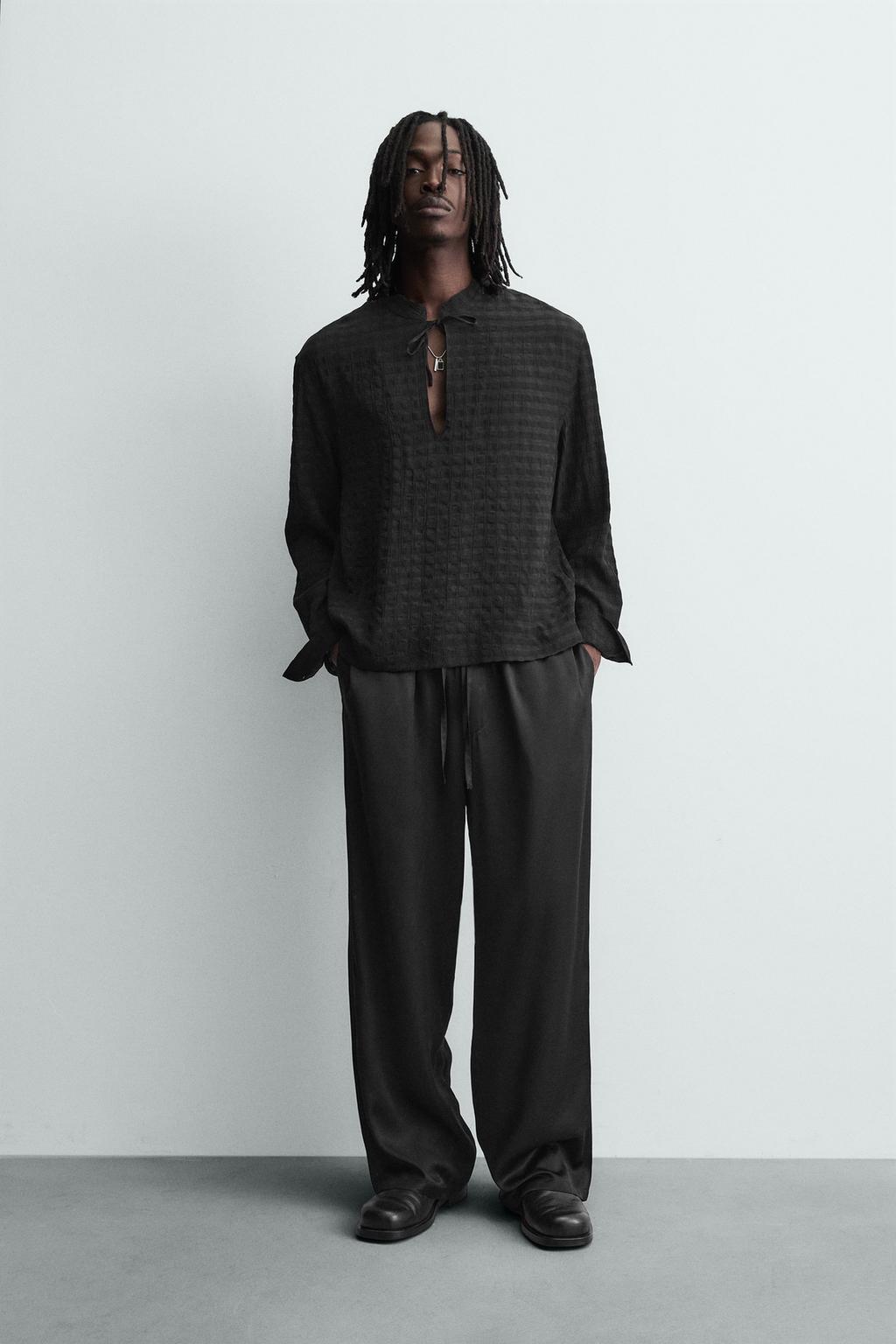 СТРУЯЩИЕСЯ БРЮКИ-ДЖОГГЕРЫ