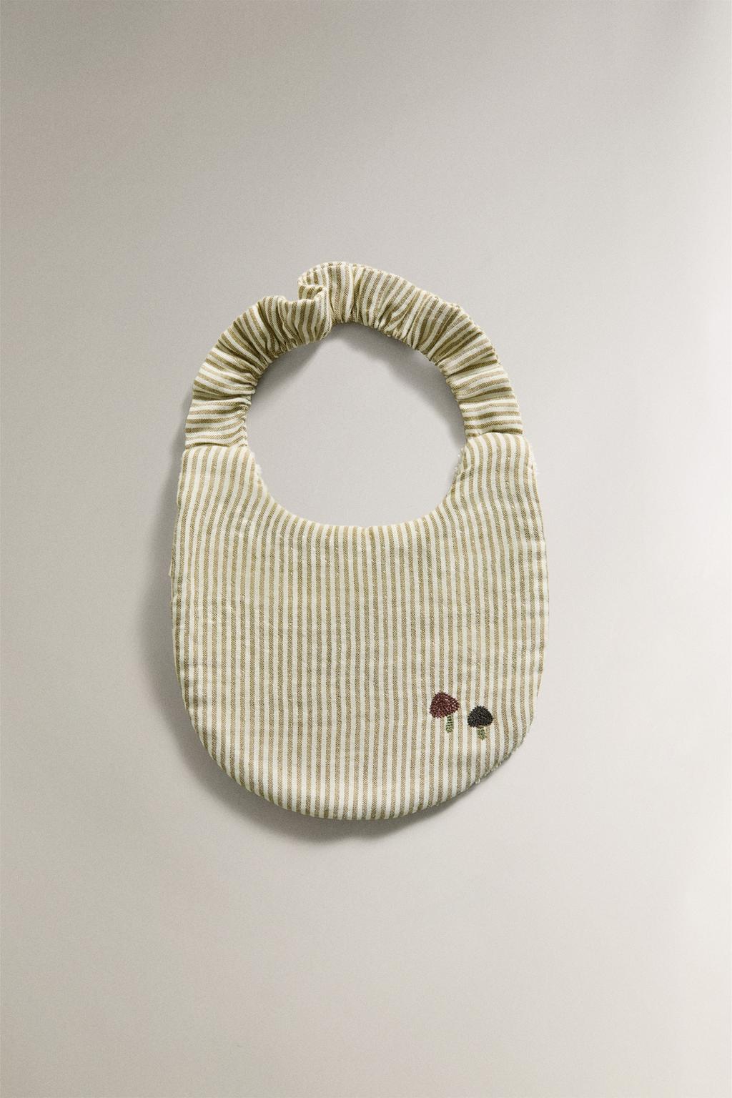 Полосатый слюнявчик из муслина для малышей