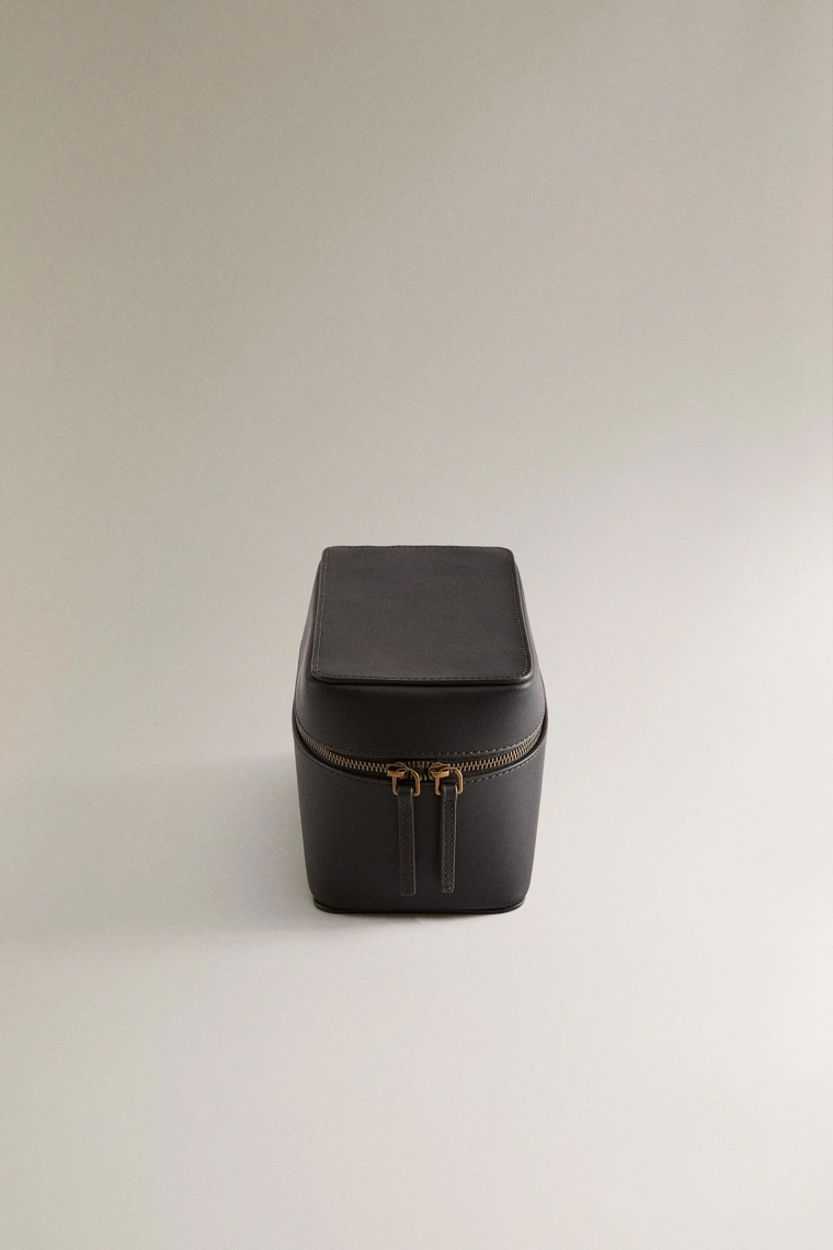 Кожаная косметичка для украшений в дорожный стиле