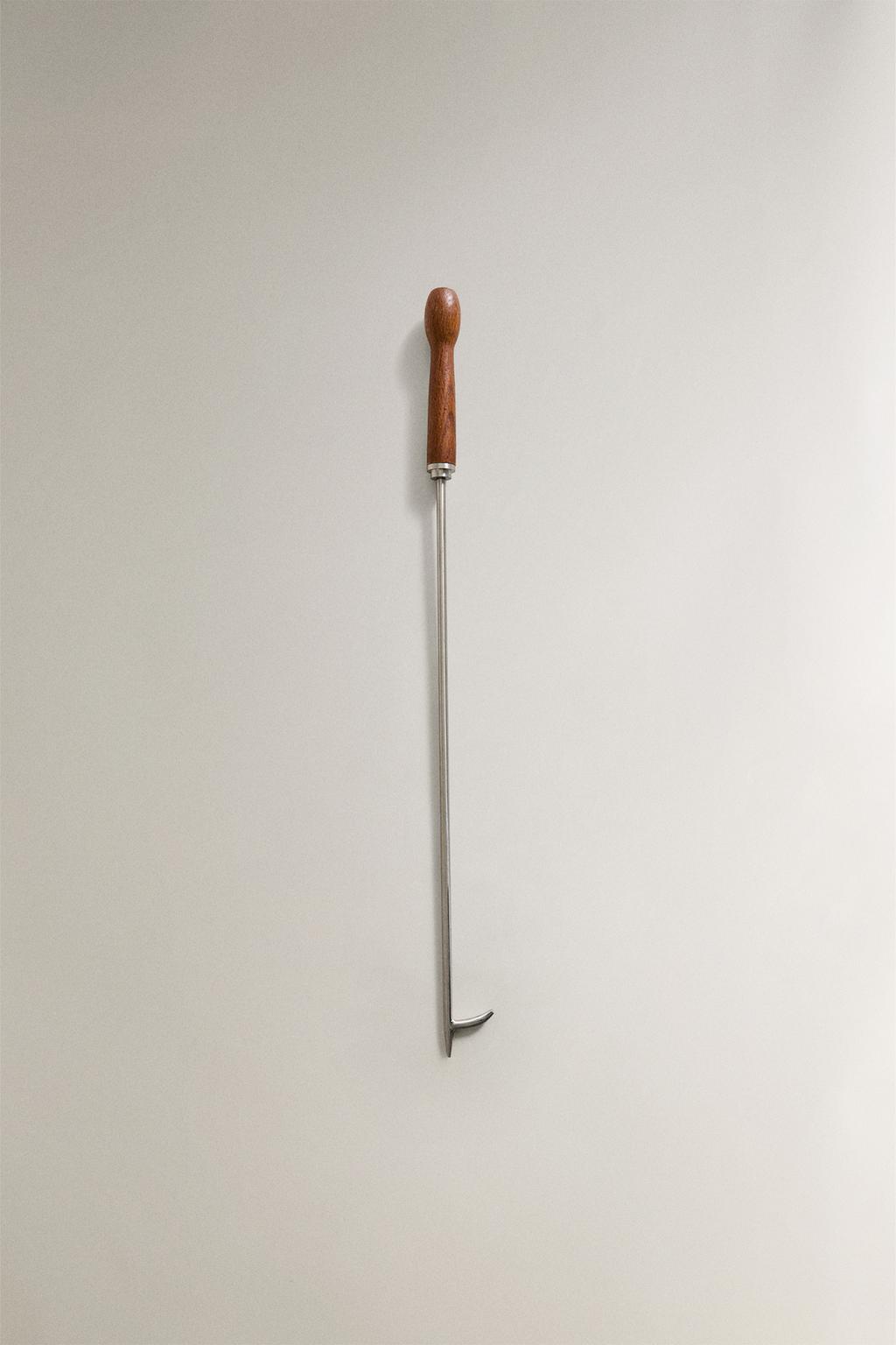 Стальная толкалка для камина