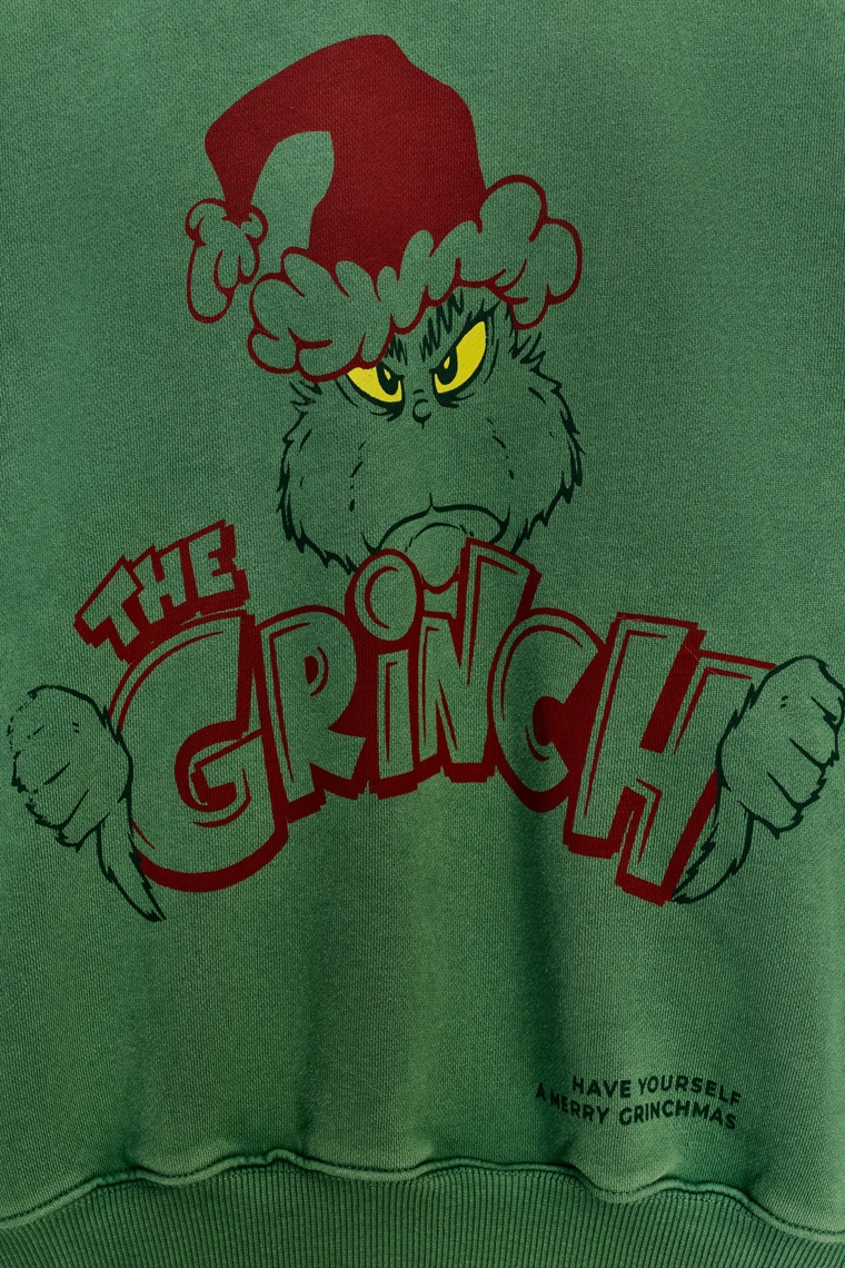 ТОЛСТОВКА GRINCH™ CHRISTMAS С ЭФФЕКТОМ ПОТЕРТОСТИ