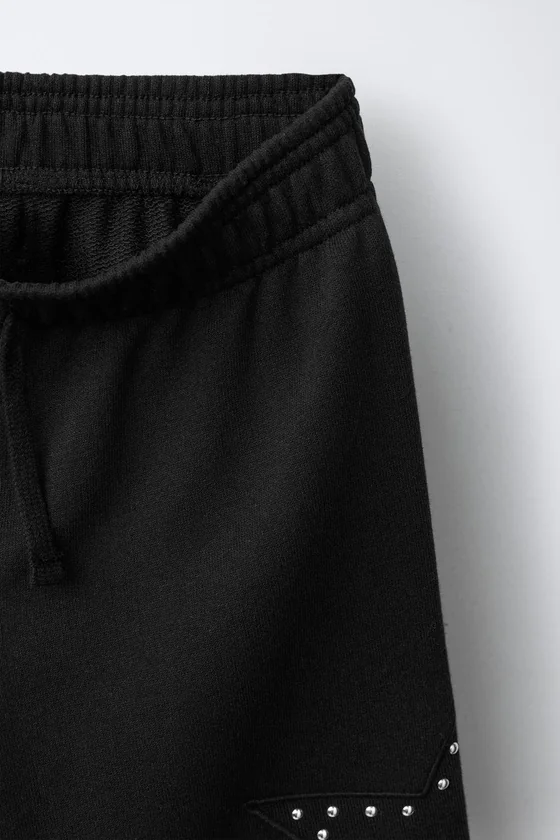 БРЮКИ WIDE LEG С ЗАКЛЕПКАМИ И ЗВЕЗДАМИ