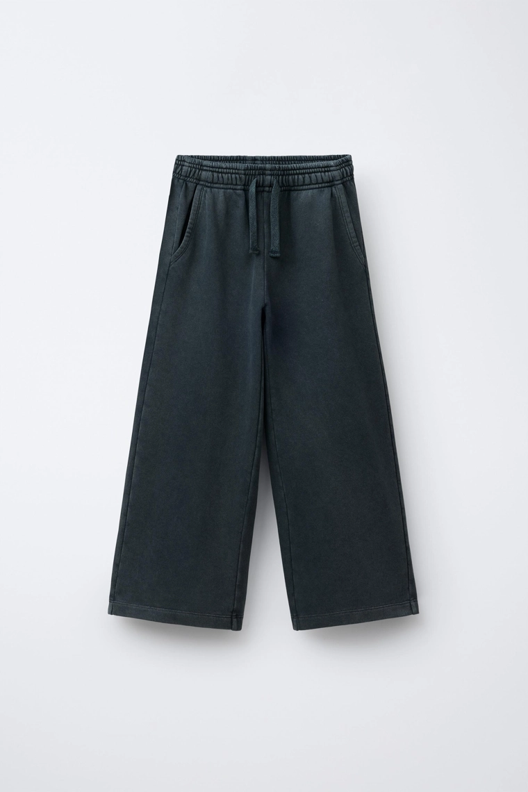 БРЮКИ WIDE LEG С ЭФФЕКТОМ ПОТЕРТОСТИ, ЗВЕЗДАМИ И ЗАКЛЕПКАМИ