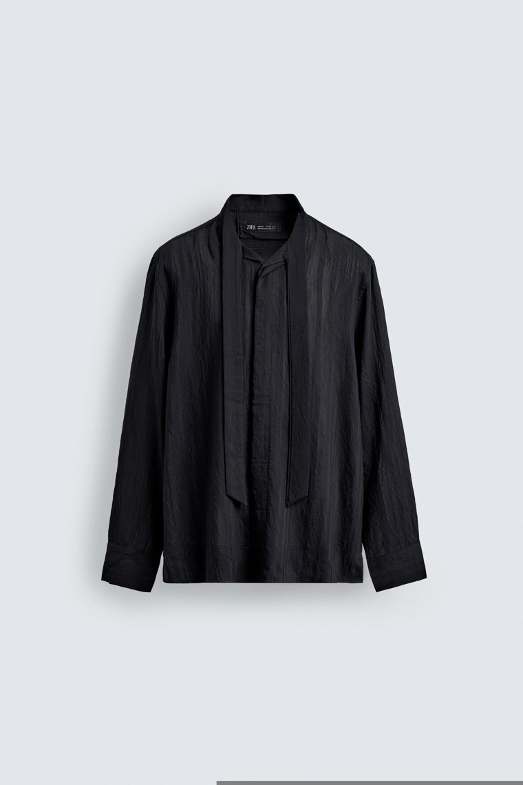 РУБАШКА ИЗ СТРУЯЩЕЙСЯ ТКАНИ С БАНТОМ