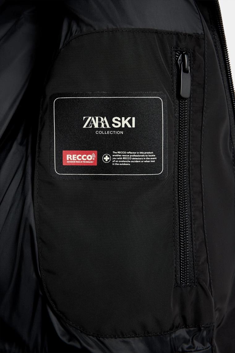 ПУХОВИК ИЗ ИСКУССТВЕННОЙ ОВЧИНЫ HEIQ XREFLEX™ С ТЕХНОЛОГИЕЙ RECCO® — SKI COLLECTION