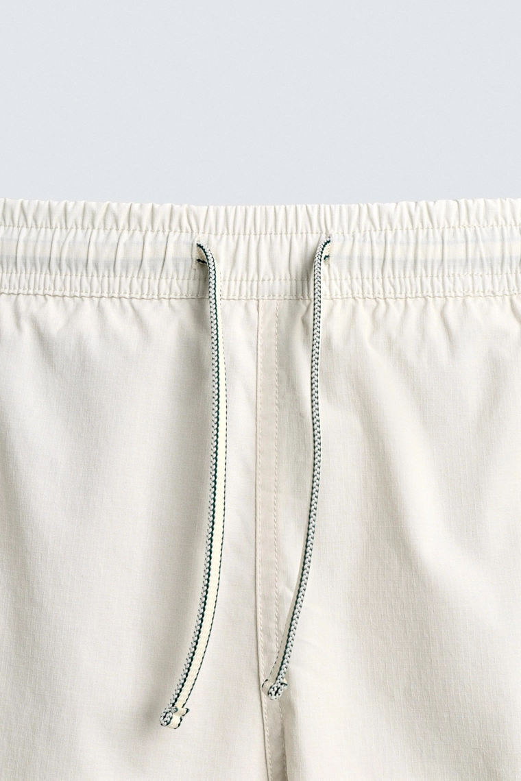 Длинные полосатые плавательные трусы