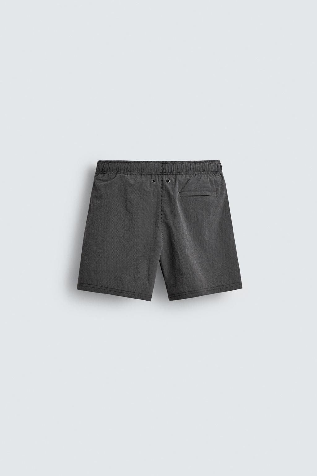 Полосатые плавательные трусы