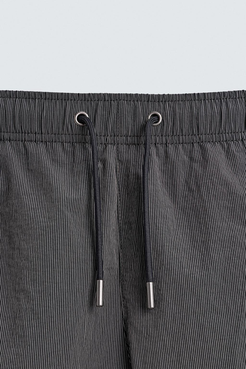 Полосатые плавательные трусы