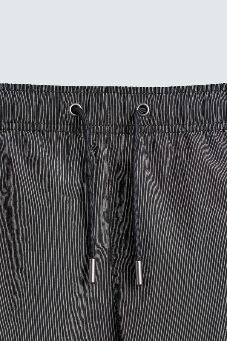 Полосатые плавательные трусы