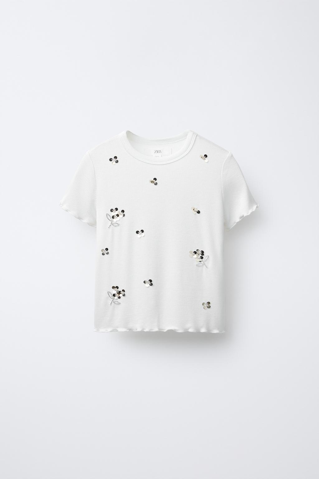 Футболка с пайетками и листьями