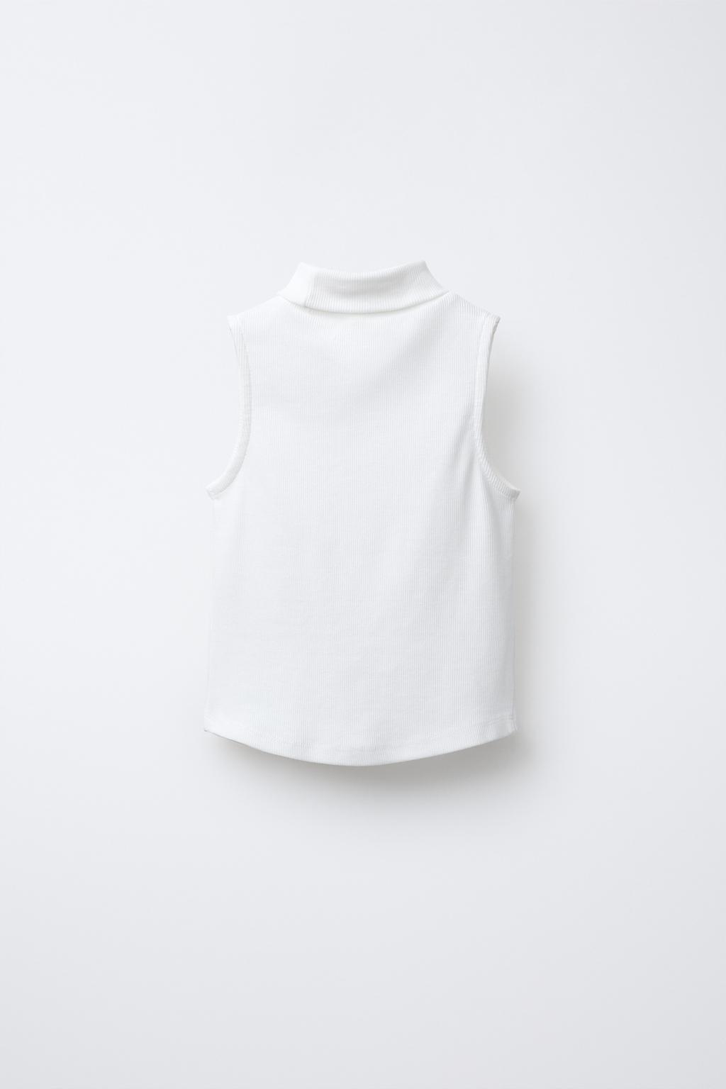 ТОП В РУБЧИК С ВОРОТНИКОМ-СТОЙКОЙ И ЗАКЛЕПКАМИ «ЗВЕЗДЫ»