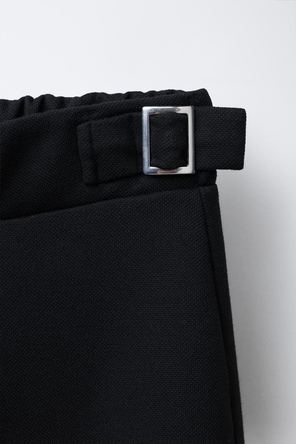 БРЮКИ КОСТЮМНЫЕ С ПРЯЖКАМИ