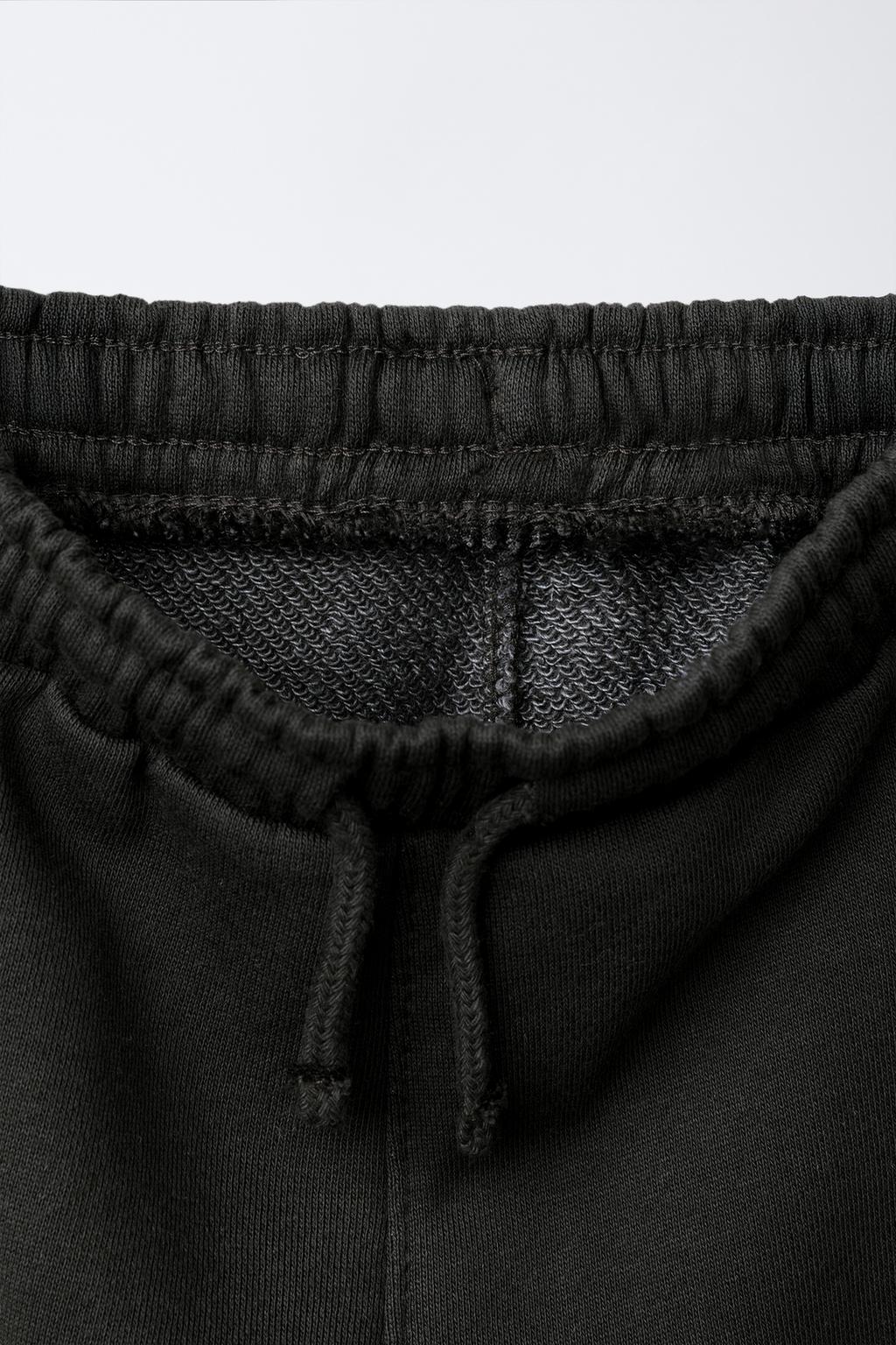 БРЮКИ-ДЖОГГЕРЫ С ЭТИКЕТКОЙ